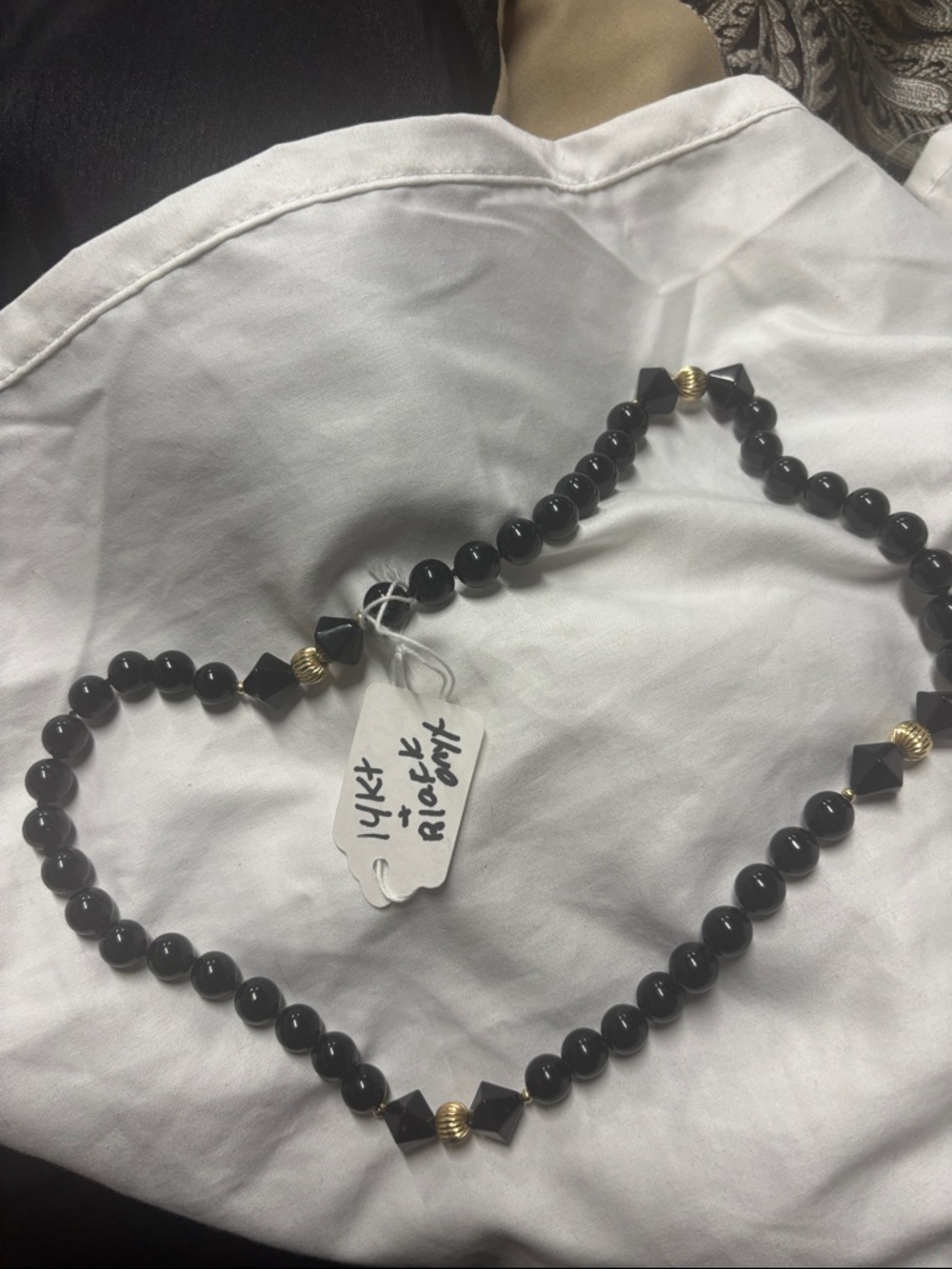 Black onyx and 14kt gold bead